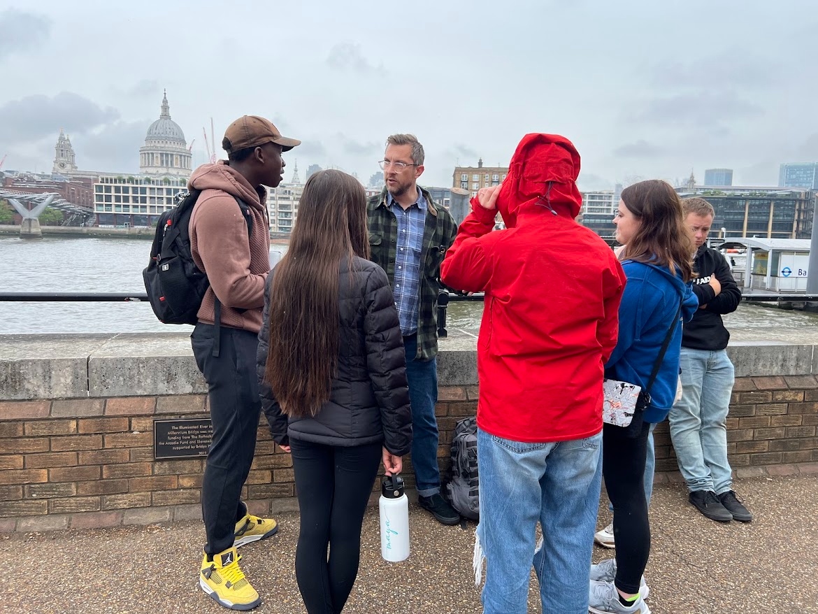 Study tour group along the River Thames with St. Paul's Cathedral in the background